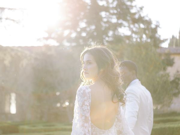 Bride and groom in the sunlight sunshine sunrays