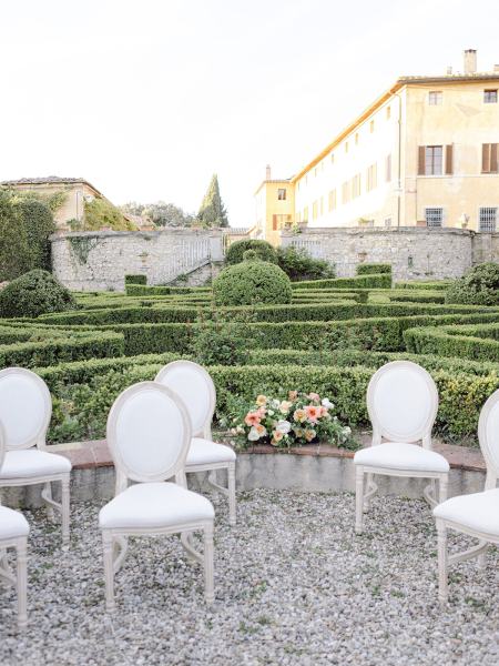 Garden setting ceremony chairs detail guests