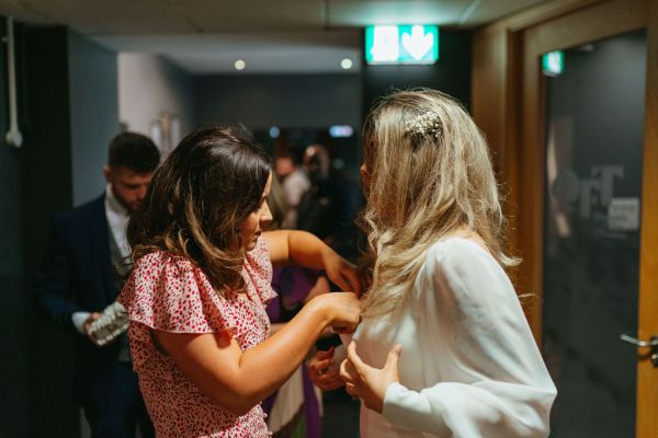 Friend and bride chat