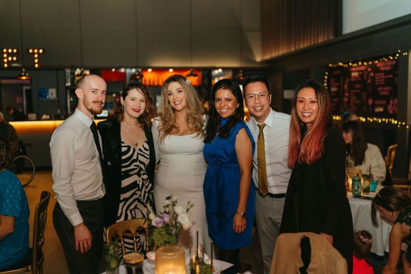 Bride and friends pose for a photo