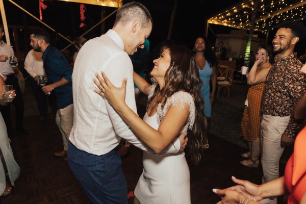 Bride and groom dance on the dancefloor together