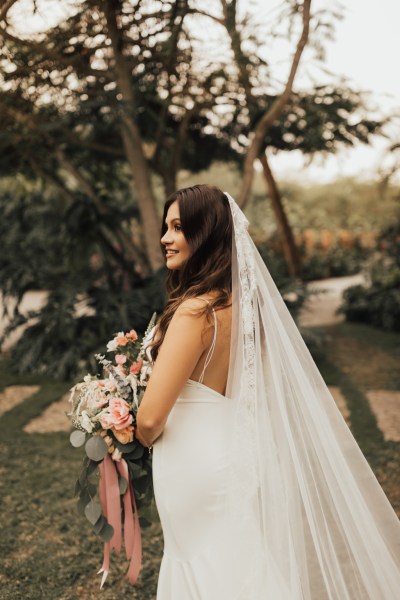 Bride from the site veil detail in garden