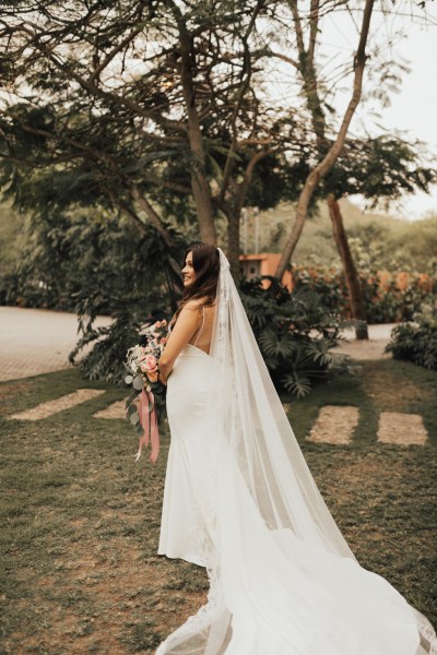 Bride from the site veil detail in garden