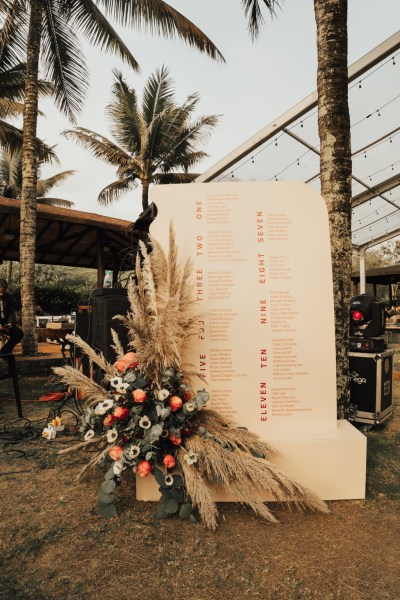 Seating arrangements for guests and flowers resting underneath