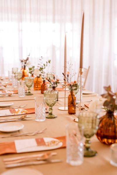 Orange autumnal table setting decor cutlery candles