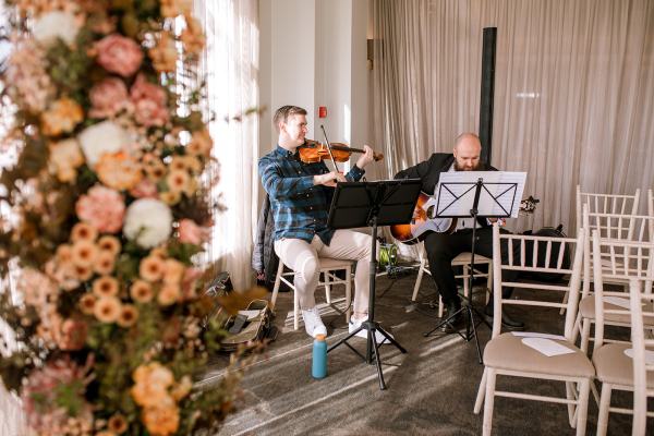 Wedding band playing music violin and guitar