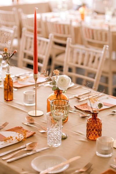 Orange autumnal table setting decor cutlery candles