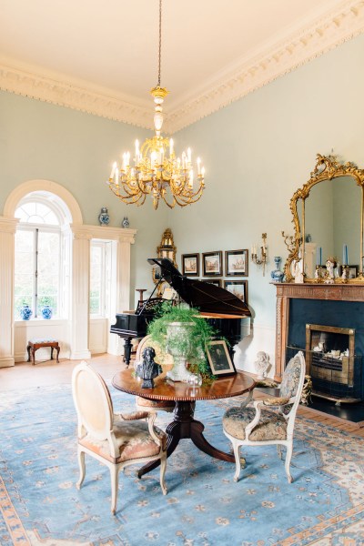 Chandelier hanging manor house room elegant mirror