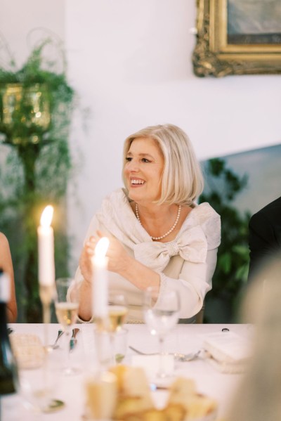 Mother of the bride smiling laughing