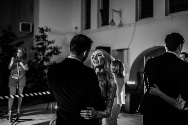 Black and white bride and groom embrace