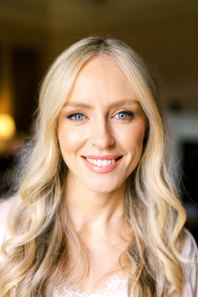 Close up of a smiling blonde bride