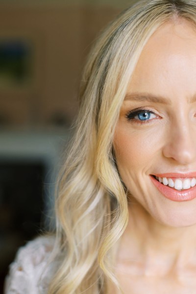 Close up of blonde bride smiling