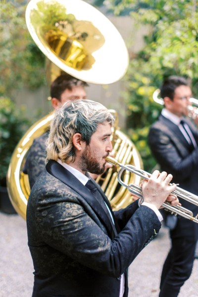 Musician playing the trumpet wedding band