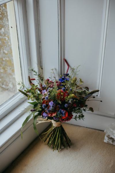 Bouquet flowers resting on windowsill