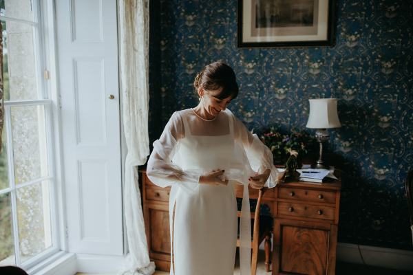 Bride getting ready in room