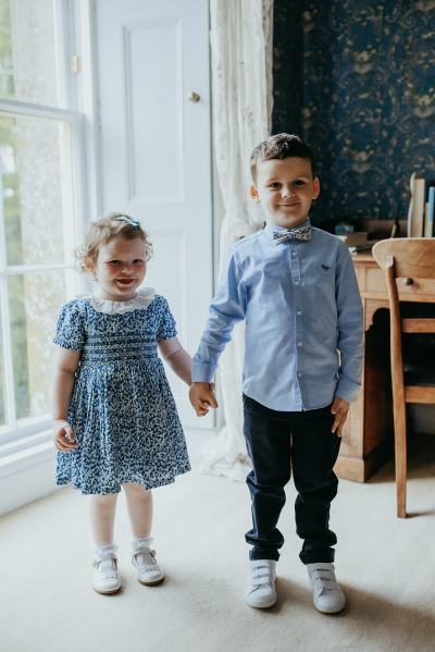 Little boy and little girl hold hands