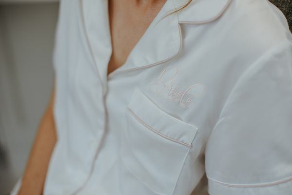 Close up of brides bridalwear loungewear