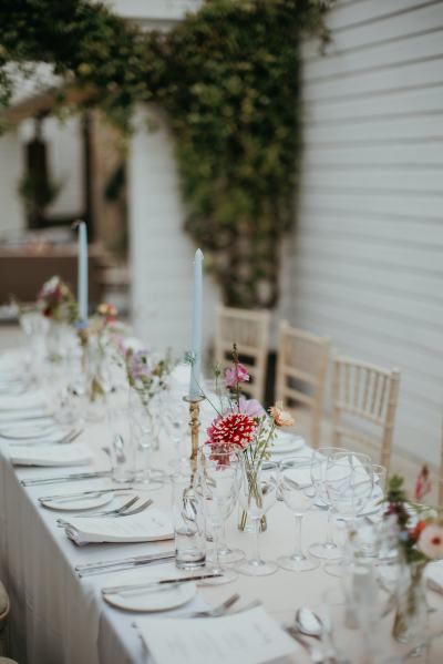 Empty dining room setting table and chairs cutlery