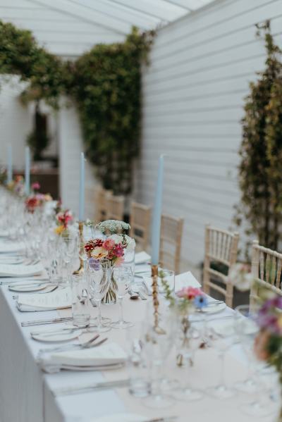 Empty dining room setting table and chairs cutlery