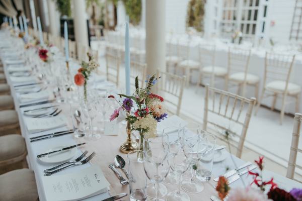 Empty dining room setting table and chairs cutlery