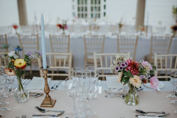 Empty dining room setting table and chairs cutlery