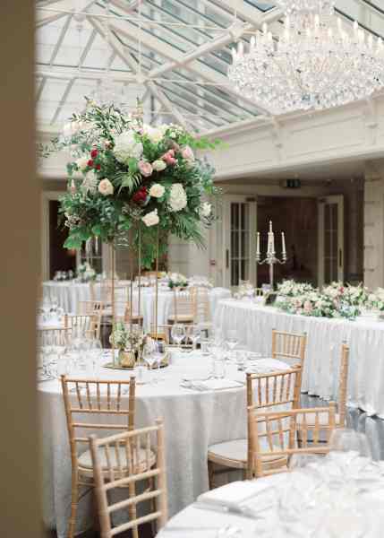 Interior wedding decor seating area dining room flower detail