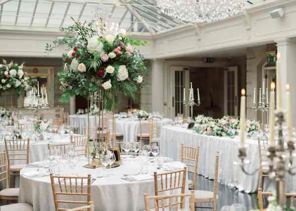 Interior wedding decor seating area dining room flower detail