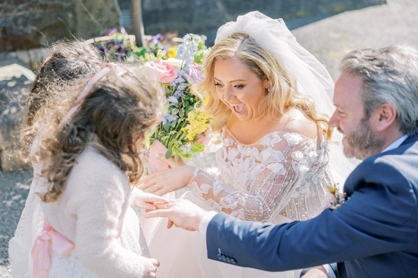 Bride groom and little girl together