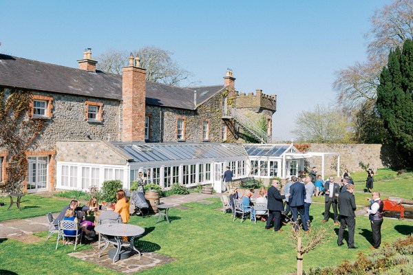 Atmosphere shot of guests outside on grass