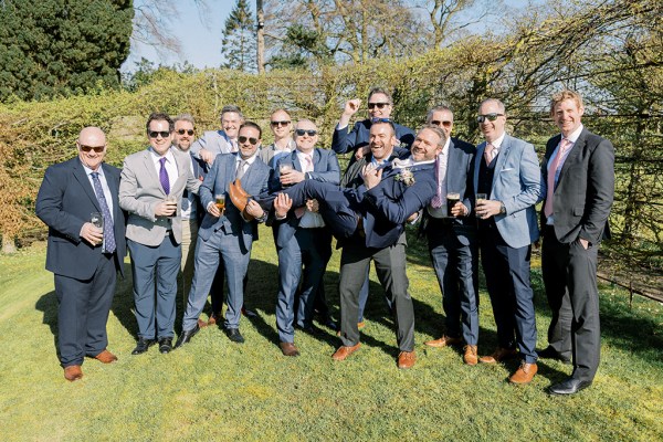 Groom and groomsmen wearing shades/sunglasses