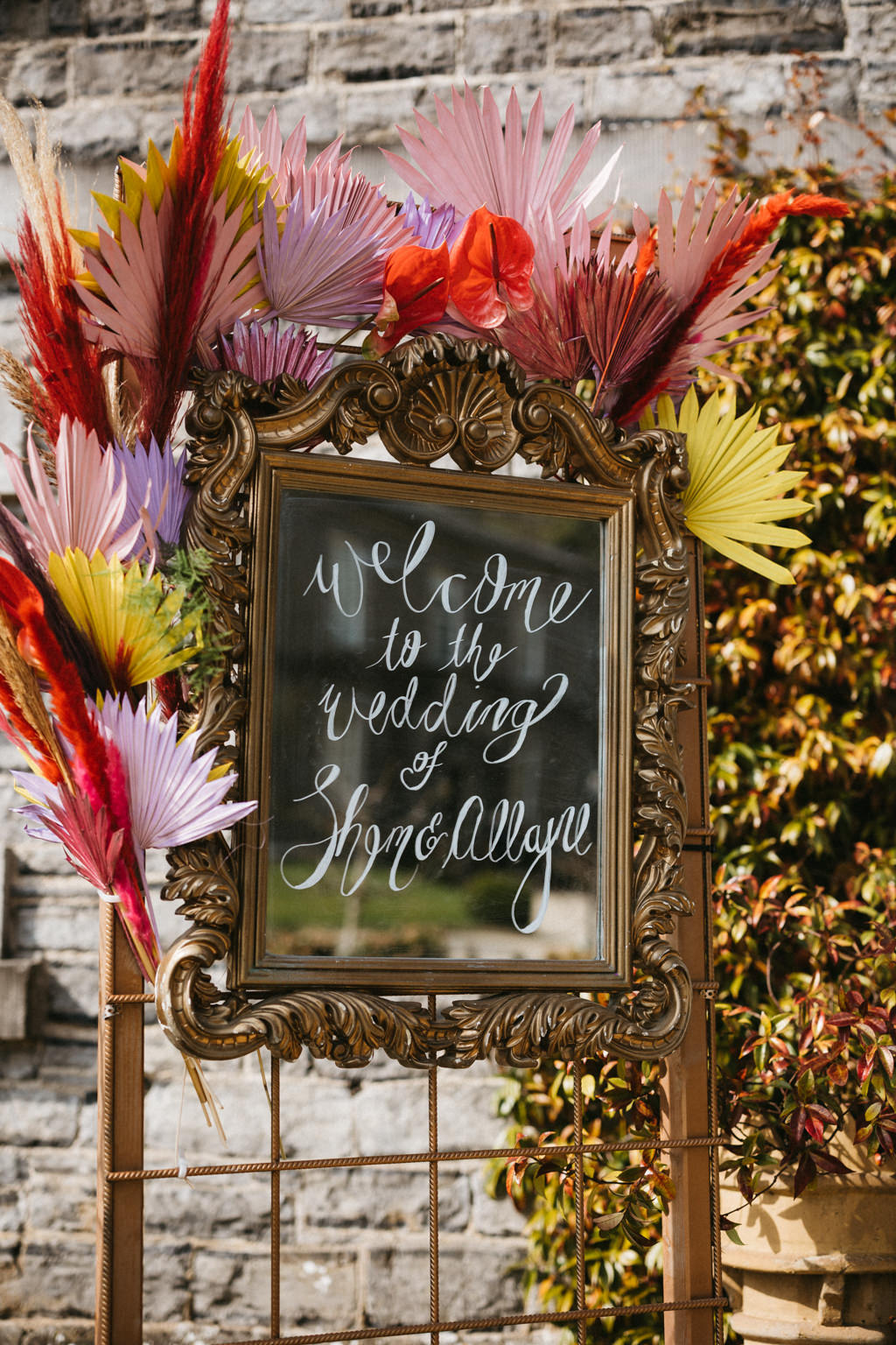 Chalk portrait detail flowers surrounded it welcome to our wedding