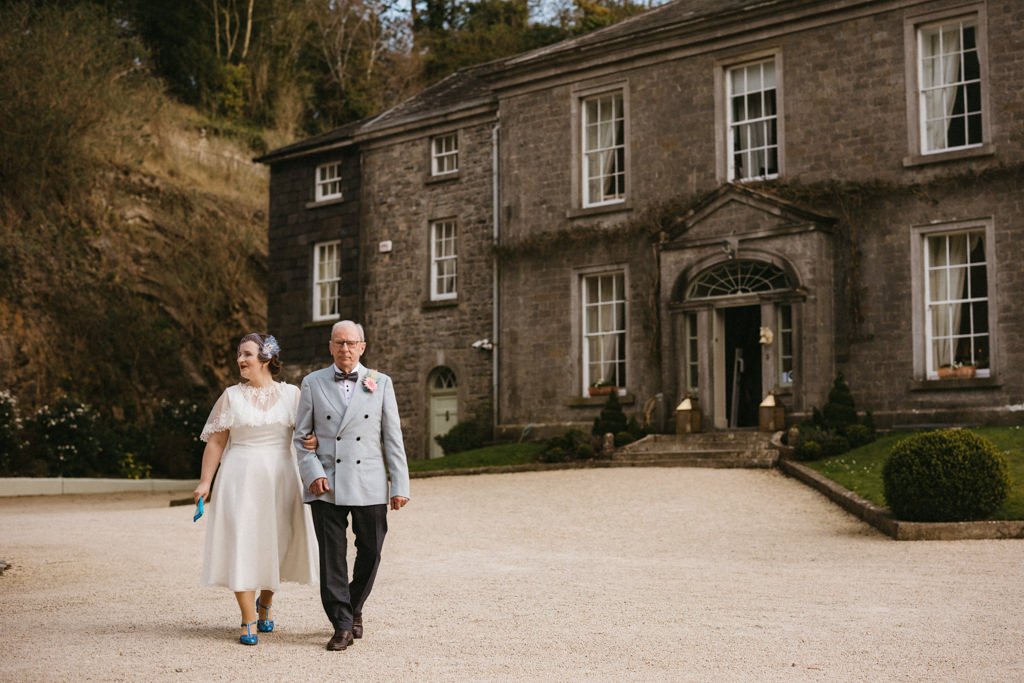 Bride and her father make their way to the ceremony