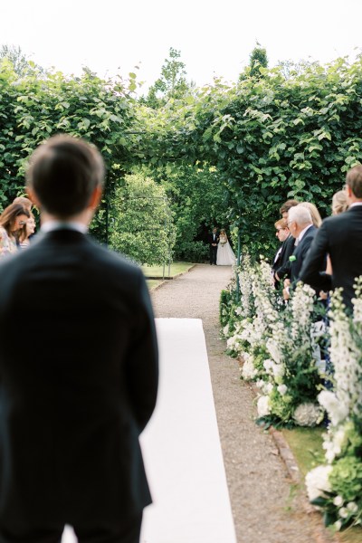 Groom waiting for bride at alter