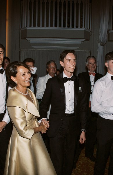 Groom dances with mother on dancefloor