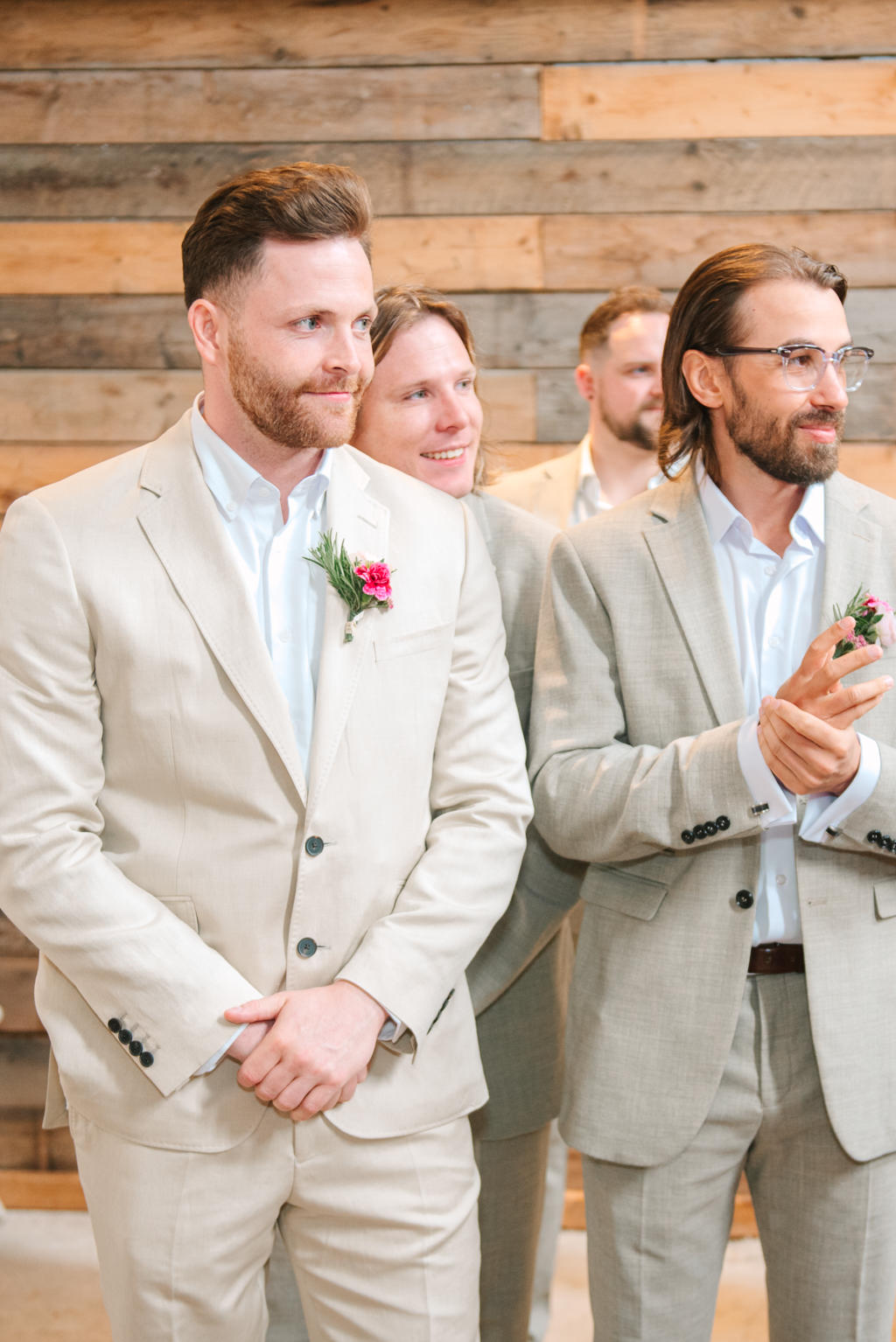 Groom and groomsmen waiting at the alter for bride