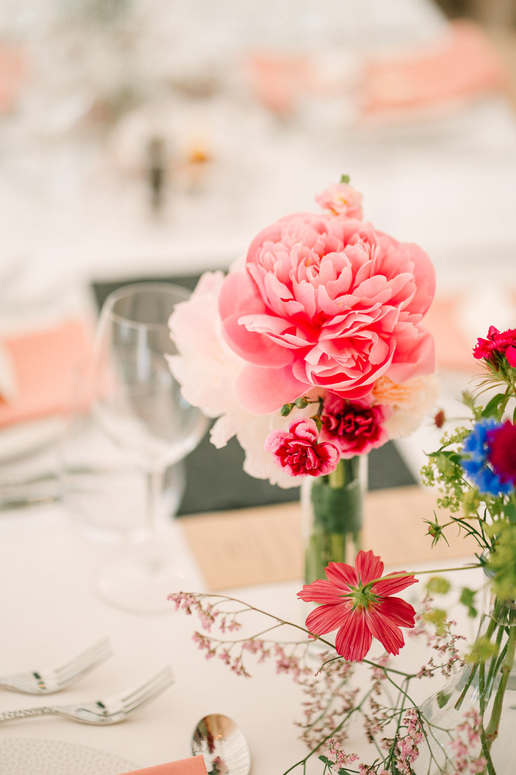 Pink flower in vase on table