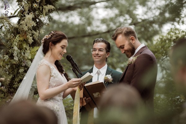 Bride groom and celebrant at the alter together