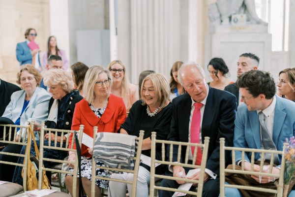 Family members sitting during ceremony