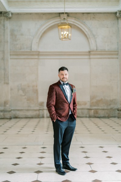 Groom standing on tiled floors