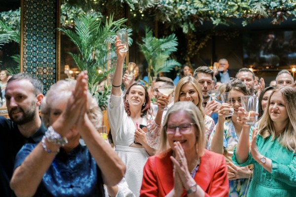 Female guests in audience listening to speech