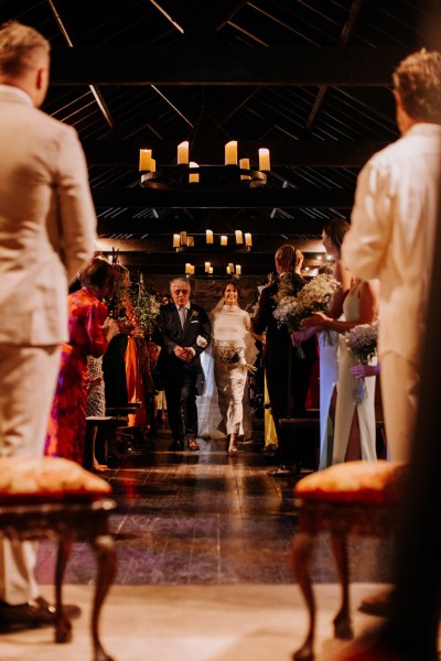 Father of the bride walks daughter down the aisle