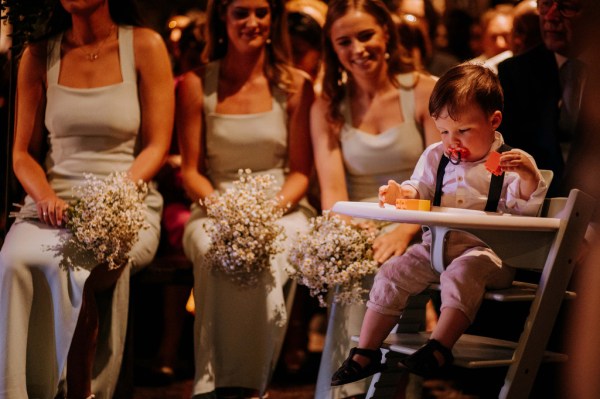 Bridesmaids and little boy all smiling