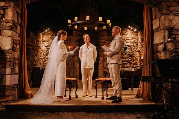 Bride reads her vows to groom at alter