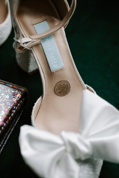 White bow detail on brides heels