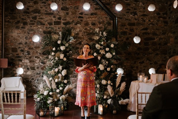 Celebrant at alter reads out speech