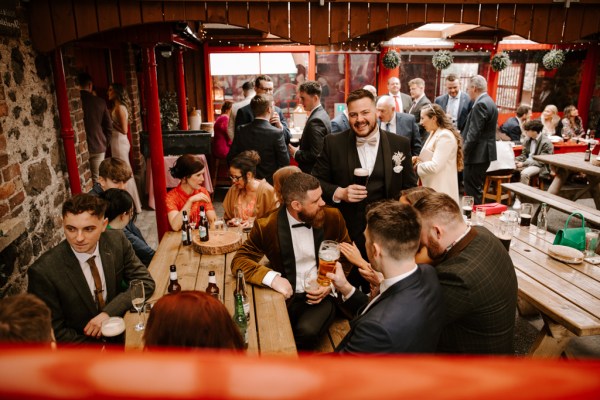 Atmosphere shot of men in suits drinking