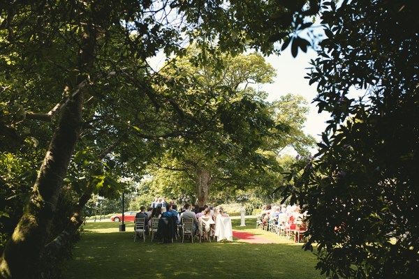 Atmosphere shot of guests seated waiting for the bride wide shot view