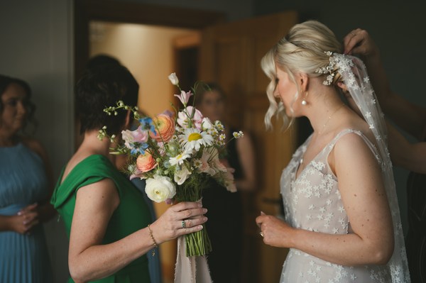 Bridesmaid and bride ready