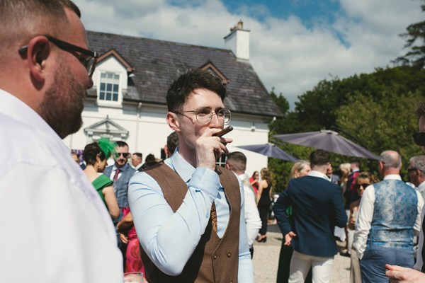 Atmosphere shot guests smoking a cigar