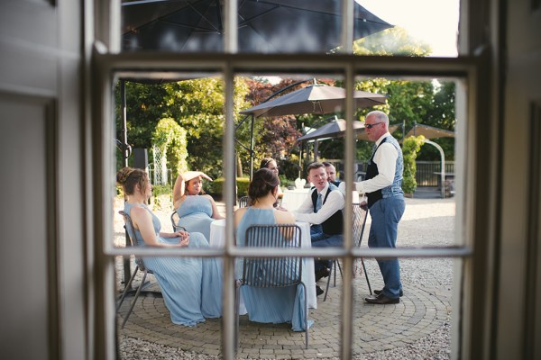 Atmosphere shot of bridesmaids groomsmen guests